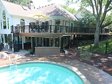 Curved Deck with Spiral Stairs and Bar St. Louis